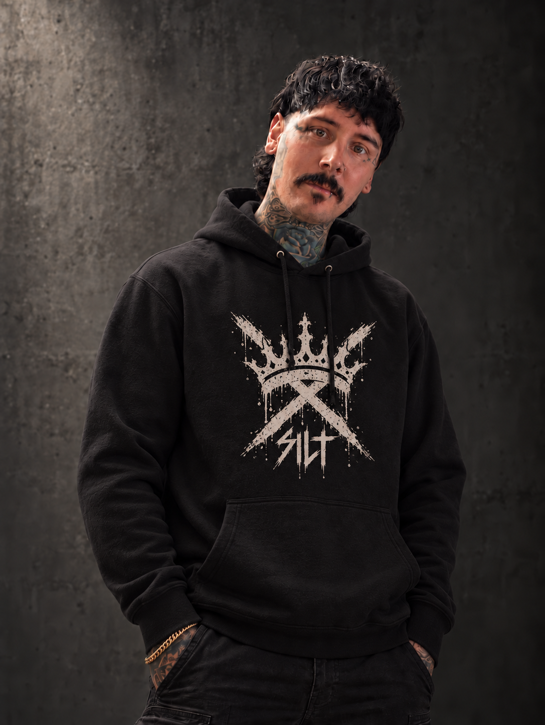 Model wearing the Casket Race Clothing Crossed Crown Hoodie — Large Front in black