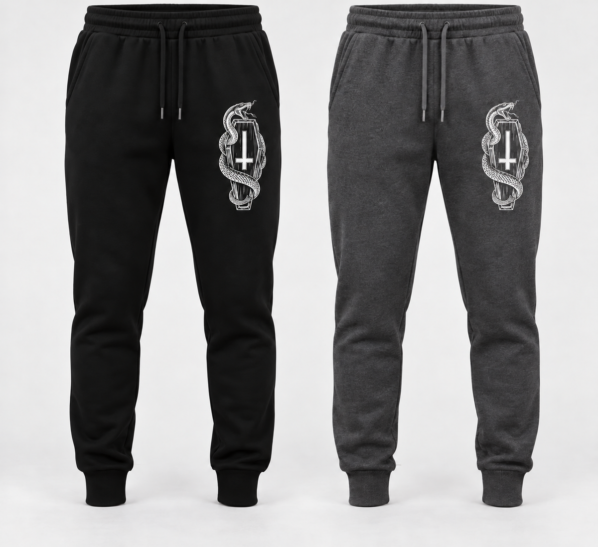 Black and grey jogger concept with white coffin, snake, and inverted-cross art on the left upper leg